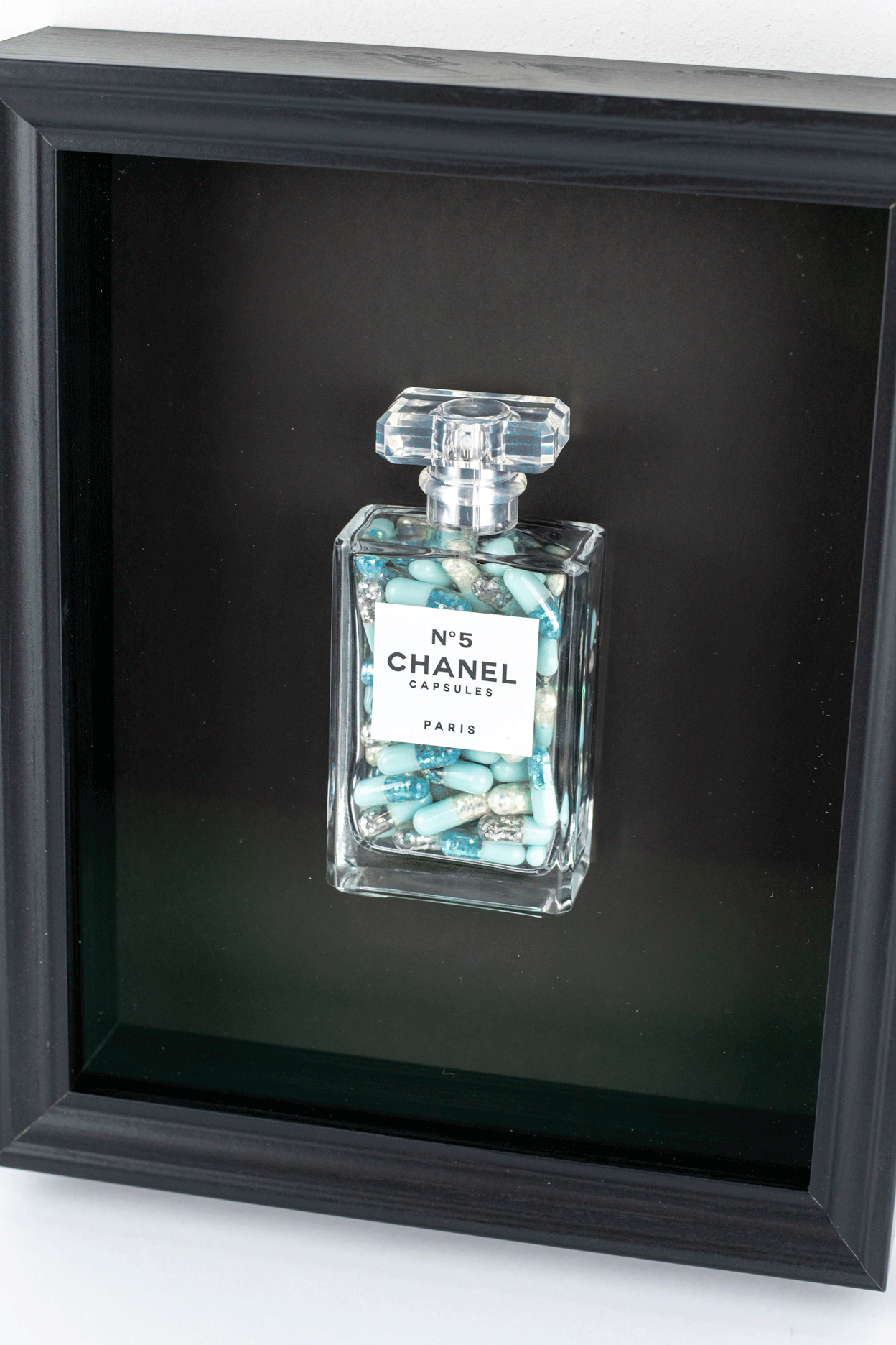 Chanel No.5 Capsules - (Black Frame / Blue Pills) by Emma Gibbons