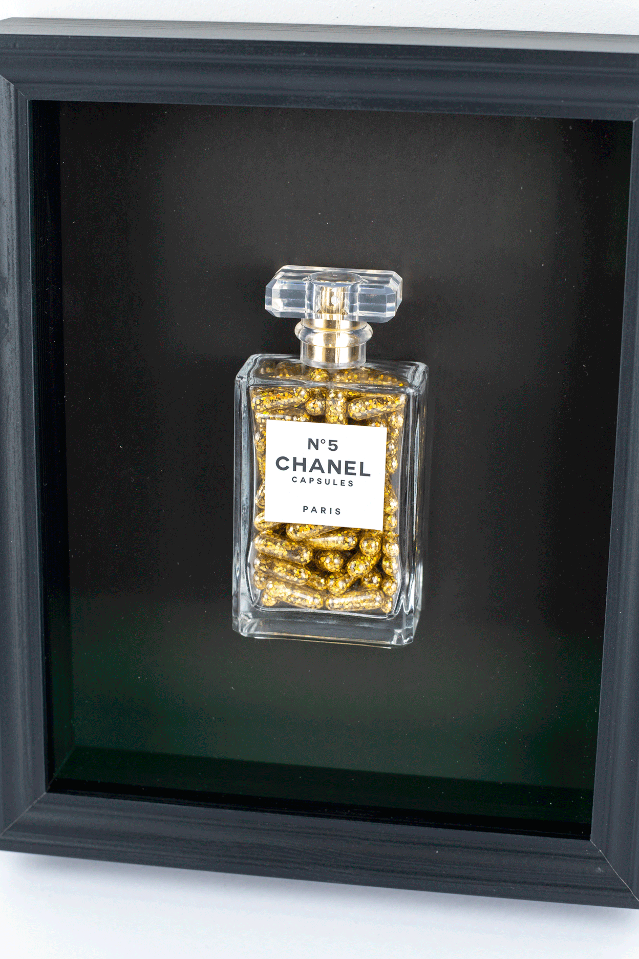 Chanel No.5 Capsules - (Black Frame / Gold Pills) by Emma Gibbons