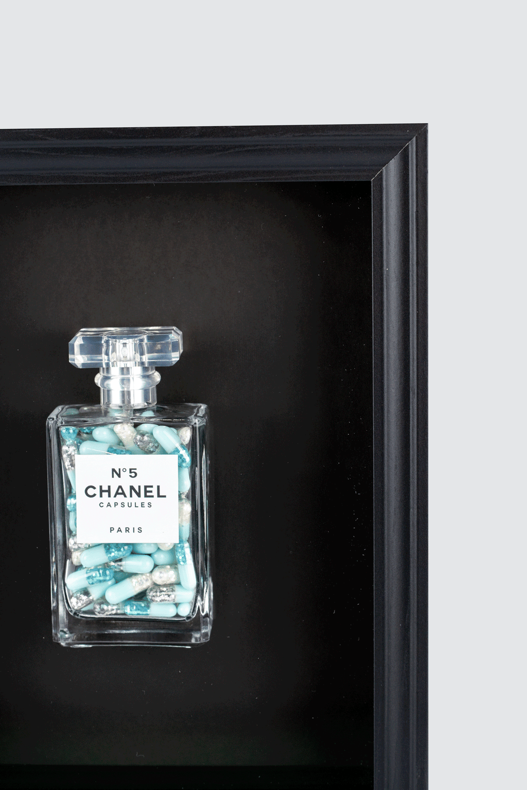 Chanel No.5 Capsules - (Black Frame / Blue Pills) by Emma Gibbons